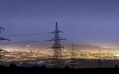 How will UK households benefit from the proposed price cap on low carbon power?